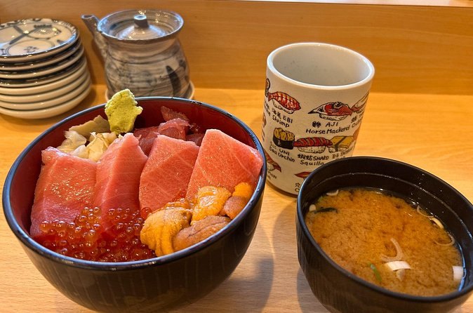A kaisendon seafood rice bowl with miso soup at a Tsukiji counter