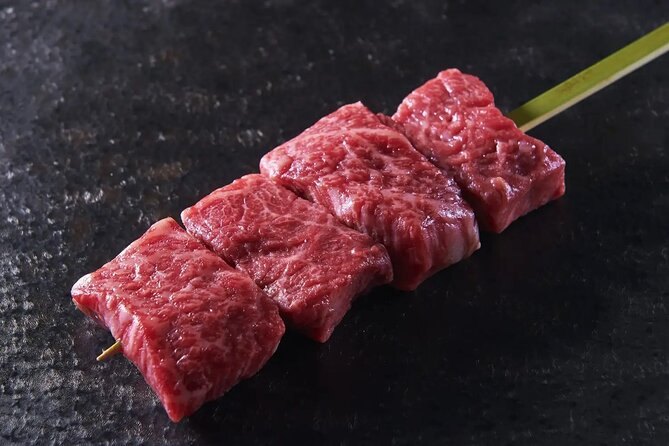 A raw Wagyu beef skewer before it goes on the grill